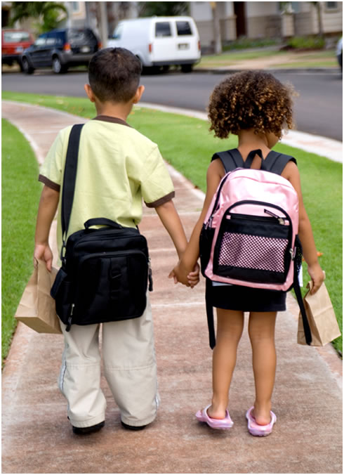 children with backpacks