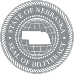 the platinum seal has an outline of the Nebraska map with the world around it on a gray background with silver highlights